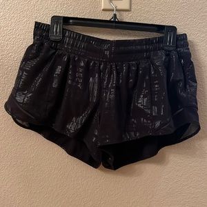 Lululemon size 12 black logo hotty hot 2.5 inch shorts